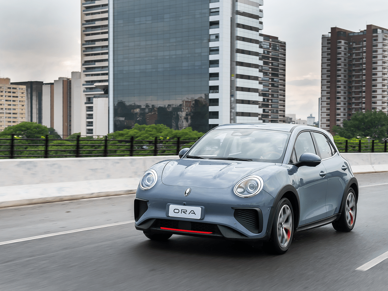 driving ORA car on the street